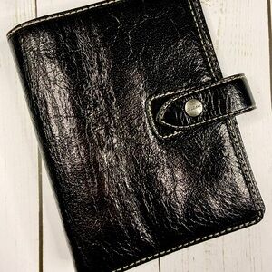 Filofax Malden Pocket planner in classic black leather.